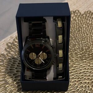 Elegant Black and Gold Watch with Bracelet